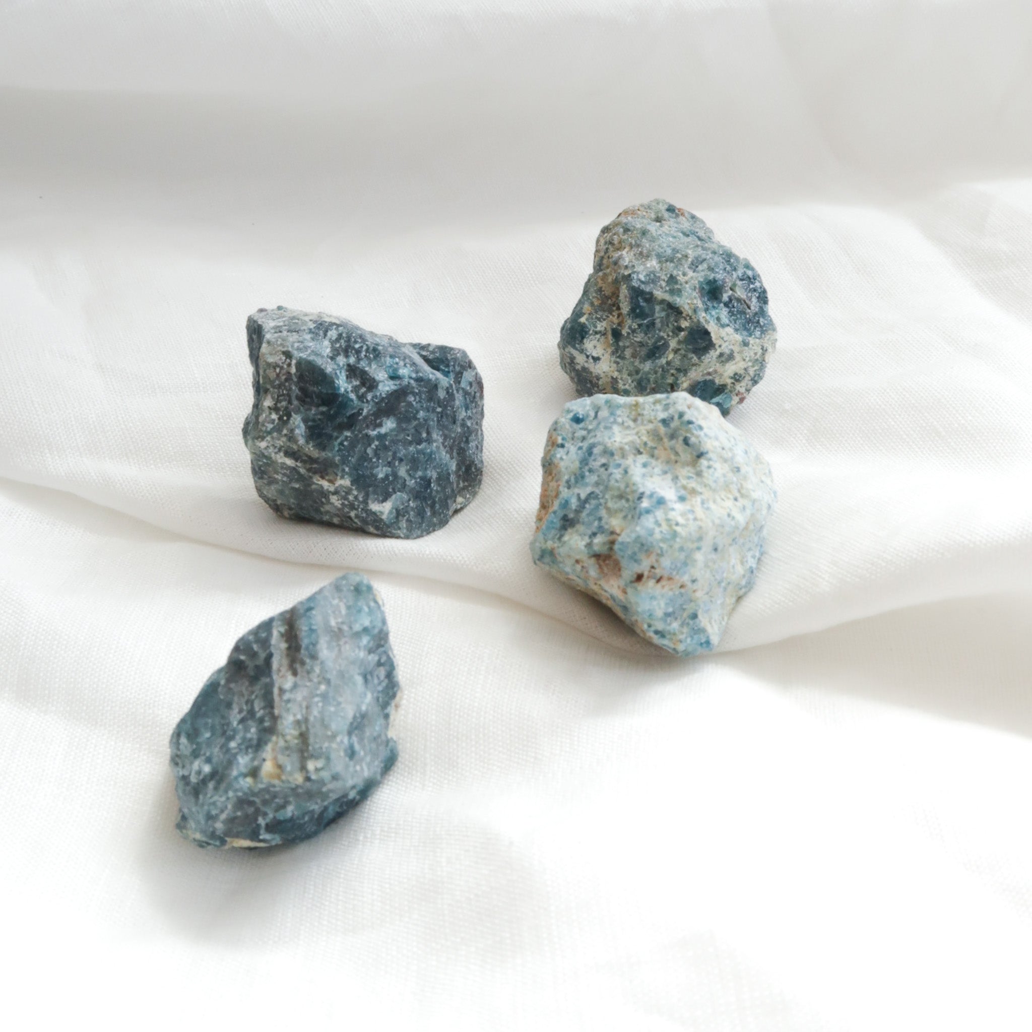 Four Small Natural Blue and Green Rough Apatite Crystal Pieces
